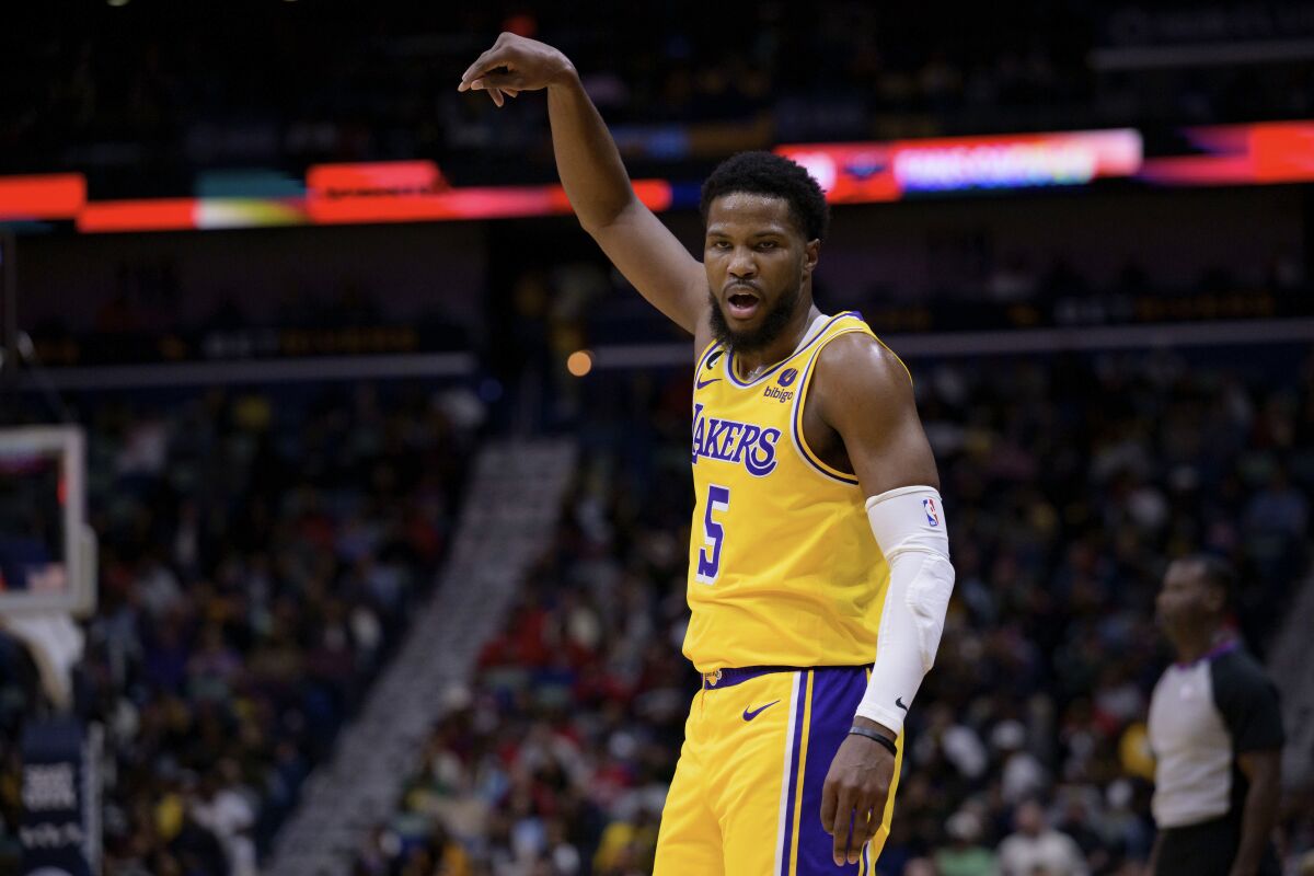 Lakers guard Malik Beasley savors a three point basket and calls out to the crowd.