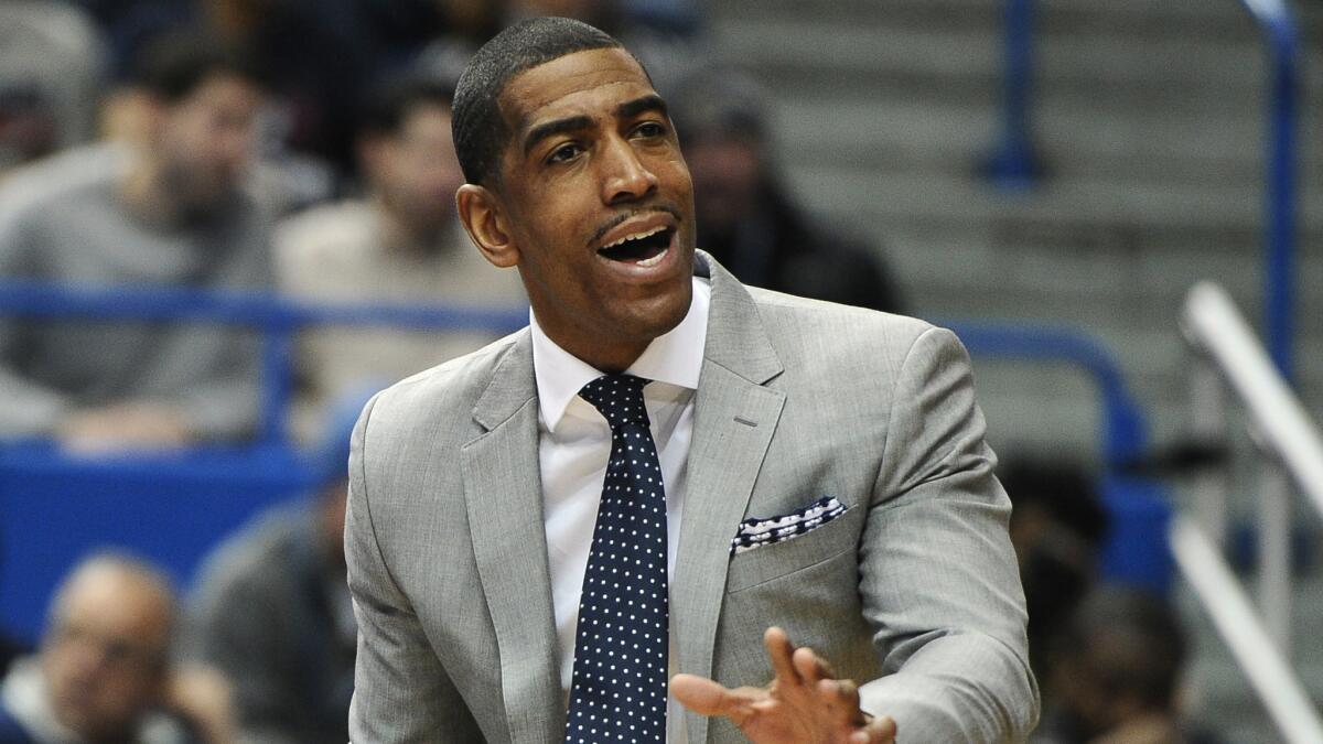 Connecticut Coach Kevin Ollie instructs his players during a win over Southern Methodist on March 1.