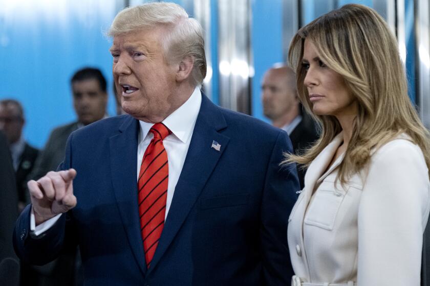 President Donald Trump addresses reporters as he arrives with first lady Melania Trump for the 74th session of the United Nations General Assembly, at U.N. headquarters, Tuesday, Sept. 24, 2019. (AP Photo/Craig Ruttle)
