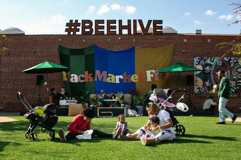 LOS ANGELES, CA - JANUARY 28: People attend Black Market Flea held at The Beehive, an event space and hub for state-of-the-art Technology and Entrepreneurship Center for emerging creatives, and future tech leaders of South LA on Saturday, Jan. 28, 2023 in Los Angeles, CA. (Jason Armond / Los Angeles Times)