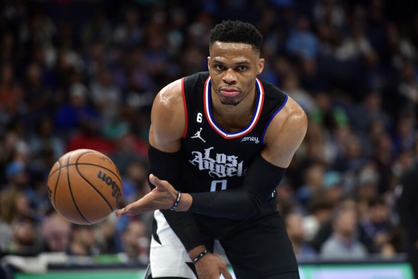 Los Angeles Clippers guard Russell Westbrook (0) handles the ball in the first half of an NBA basketball game against the Memphis Grizzlies Wednesday, March 29, 2023, in Memphis, Tenn. (AP Photo/Brandon Dill)