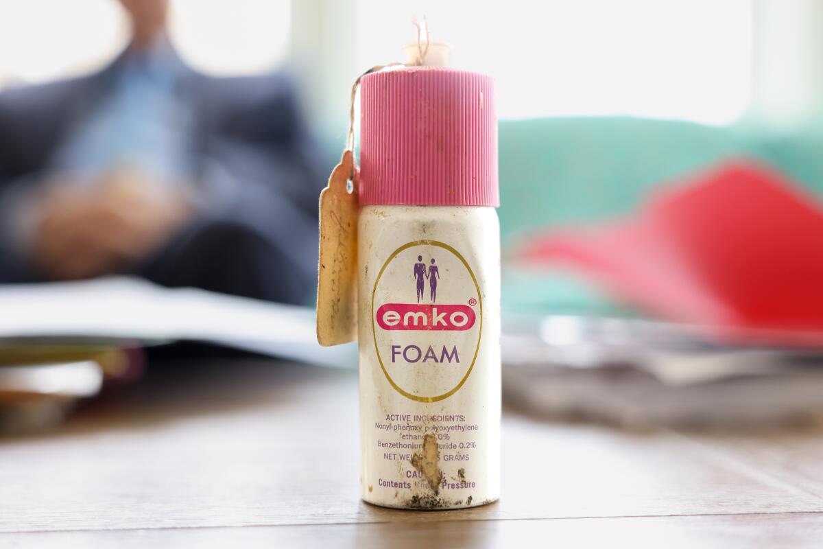 A bottle of emko contraceptive  foam, one form of birth control that Bill Baird provided in his mobile clinic, sits on the coffee table of his home. 
