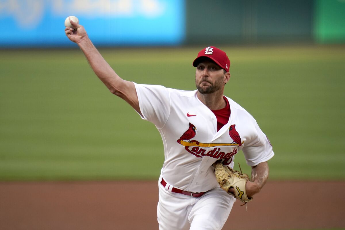 St. Louis Cardinals starting pitcher Adam Wainwright throws during the first inning of a baseball game against the New York Mets Monday, May 3, 2021, in St. Louis. (AP Photo/Jeff Roberson)