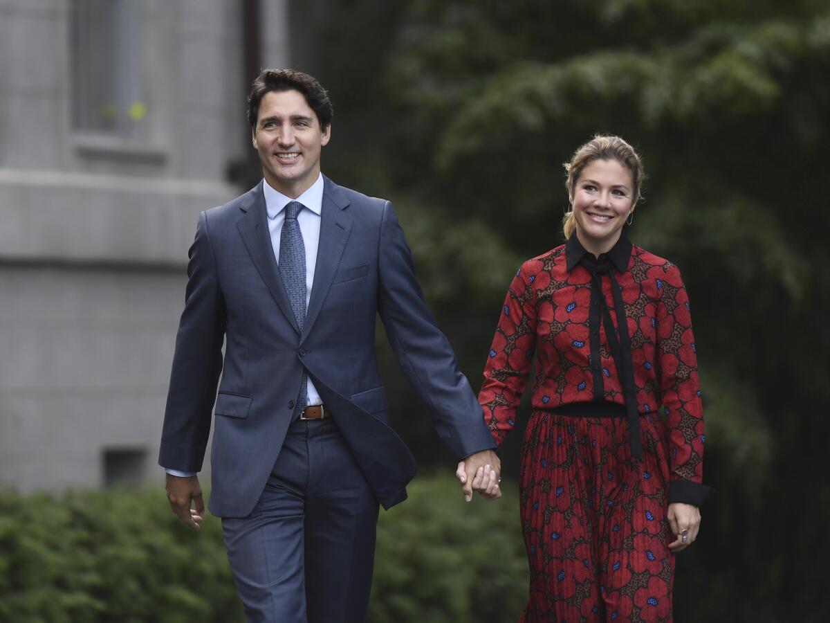 Canada's Prime Minister Justin Trudeau and his wife, Sophie Grégoire Trudeau, at Rideau Hall in Ottawa. Trudeau is in self-quarantine at home after his wife contracted the coronavirus.