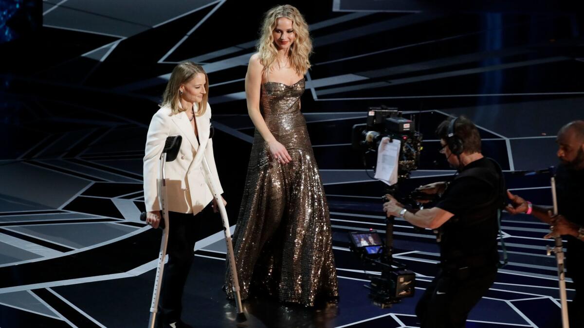 In place of last year's lead actor winner Casey Affleck, Jodie Foster and Jennifer Lawrence presented the lead actress Oscar at the 90th Academy Awards.