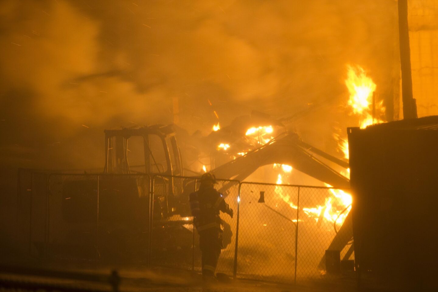 Firefighters battle a blaze.