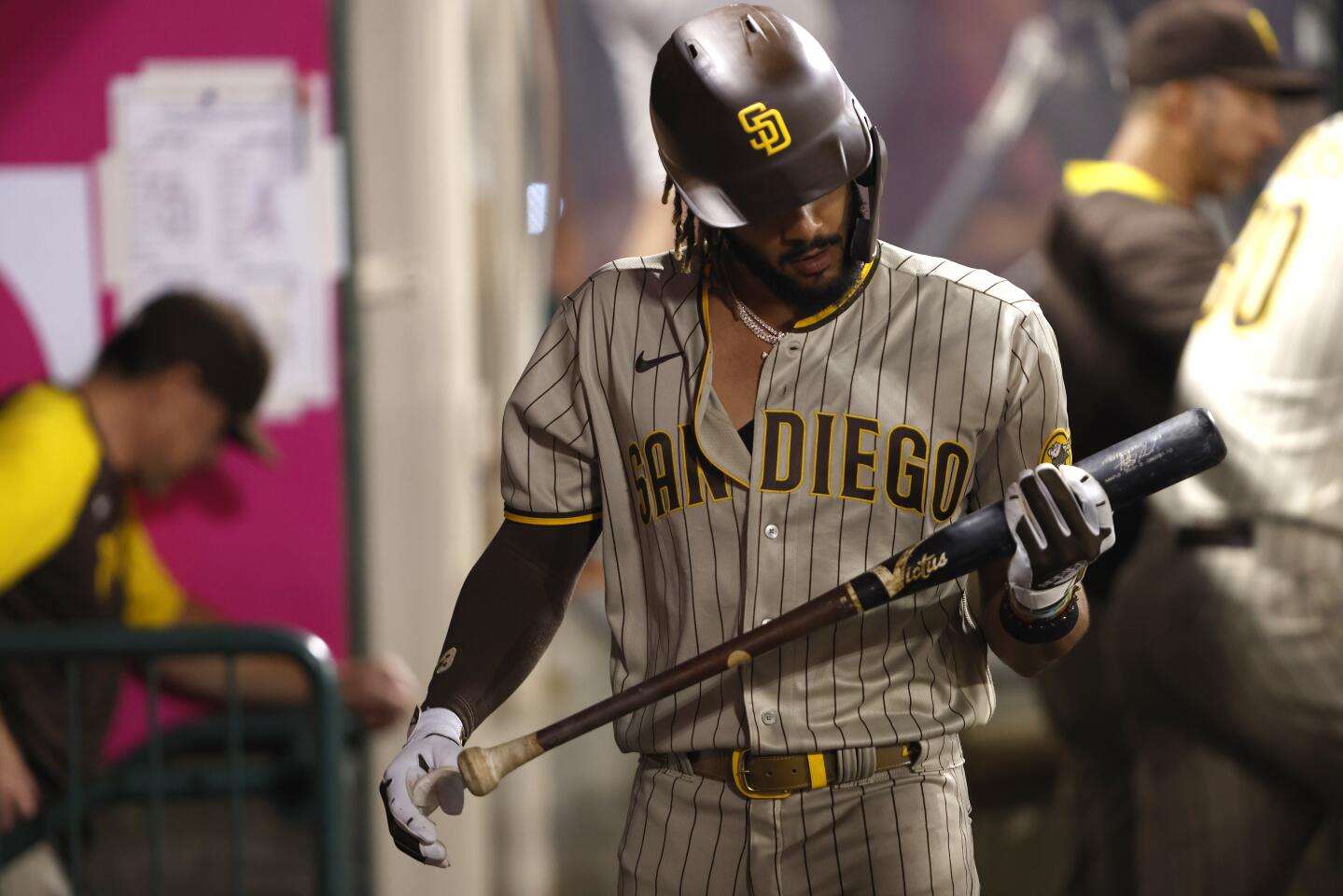 Fernando Tatis Jr. #23 of the San Diego Padres looks on after flying