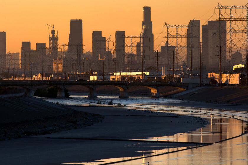 A view toward downtown Los Angeles from the Los Angeles River in Maywood, Calif., on Sept. 30, 2015.