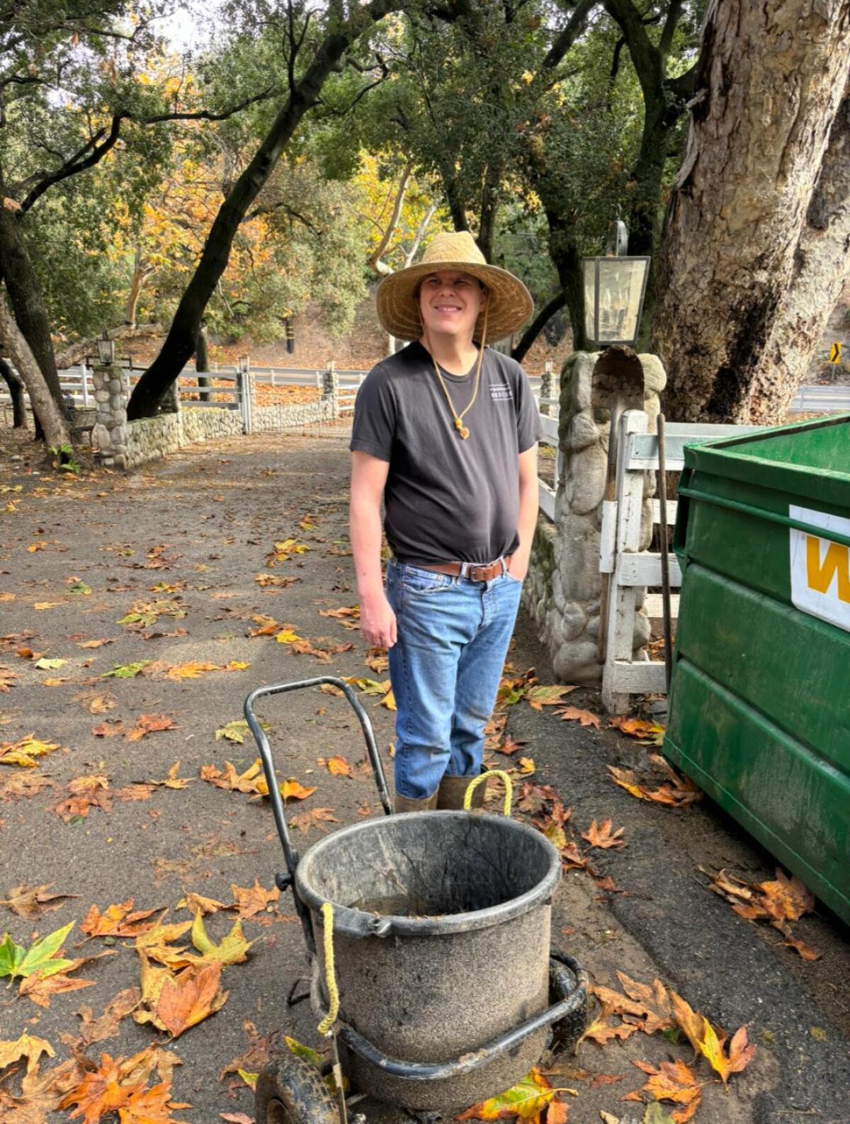 Creig Moon helps clean up at FarmHouse Rescue in Trabuco Canyon as part of the Skill-Building Program.
