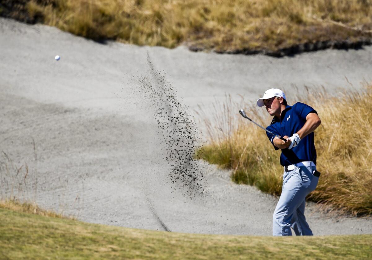 Jordan Spieth hits out of a sand trap on the eighteenth hole during the second round of the U.S. Open on Friday at Chambers Bay in University Place, Wash.