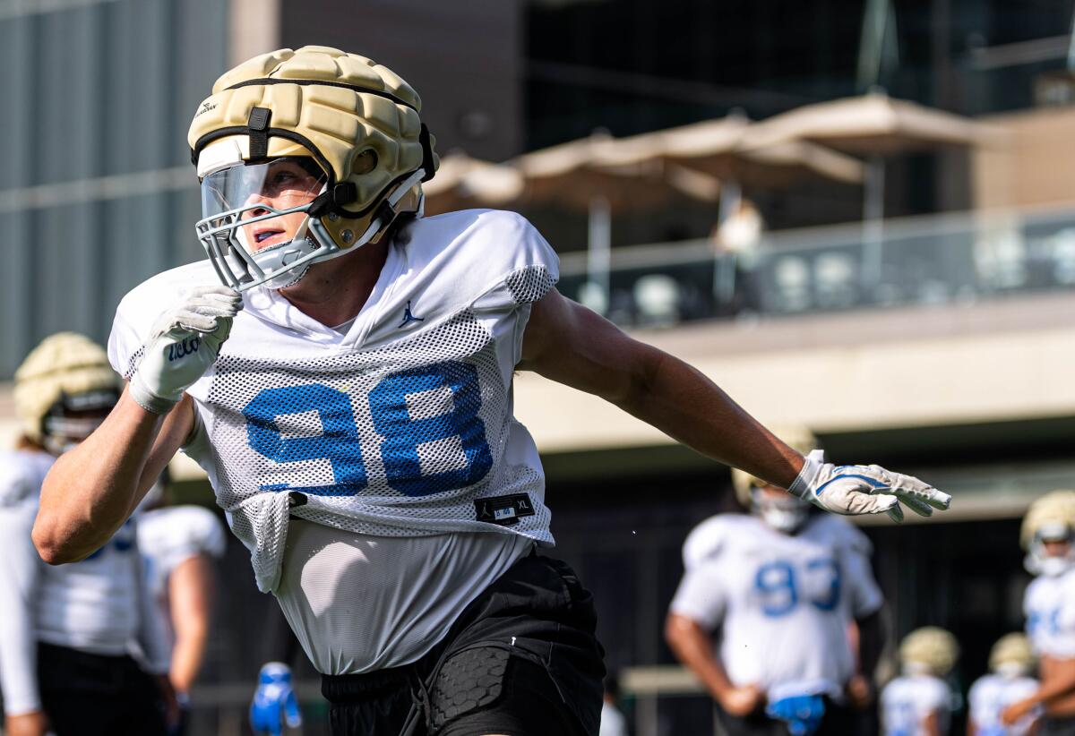 UCLA defensive lineman Luke Schuermann takes part in a drill earlier this month during fall training camp.