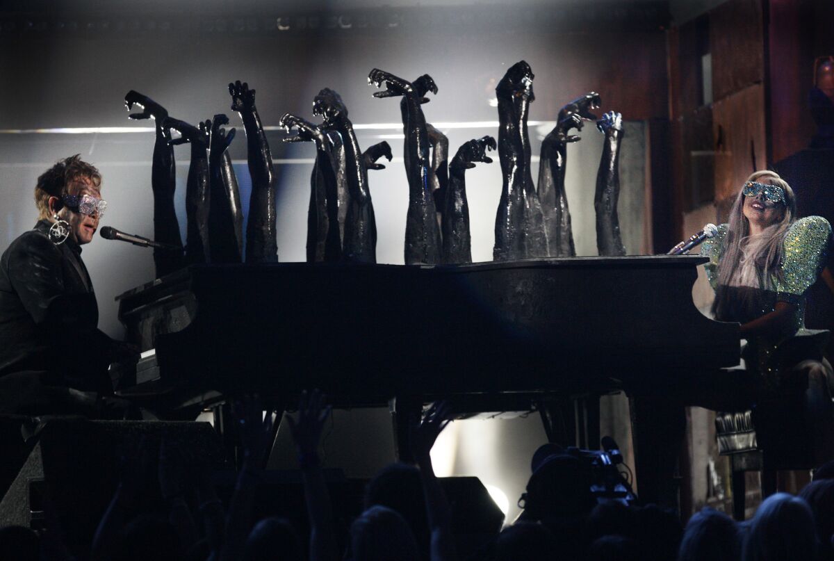 Elton John and Lady Gaga faced off at the 2010 Grammys.