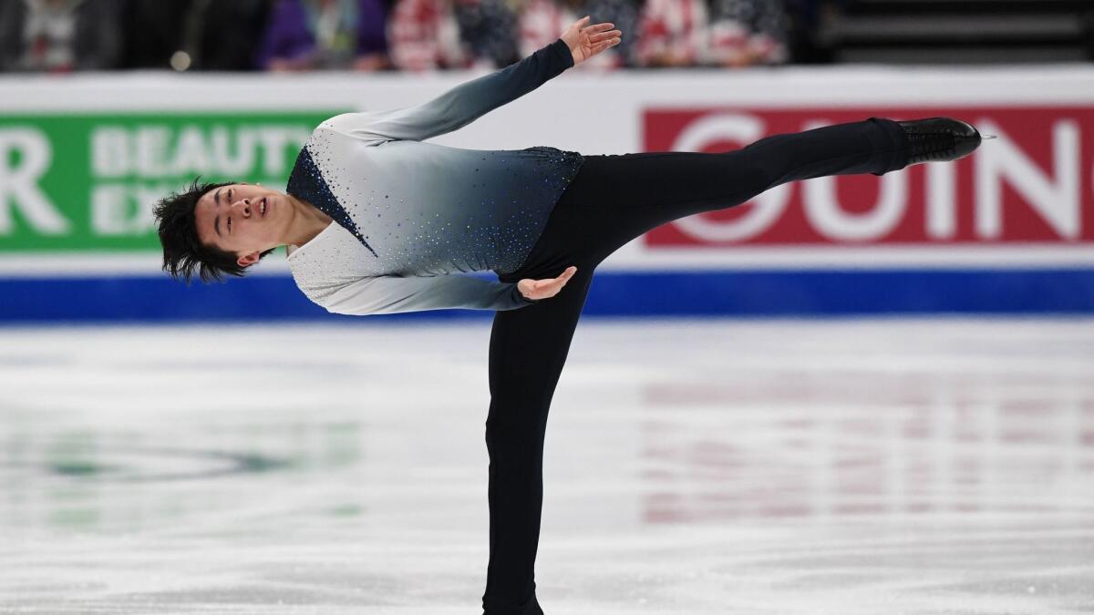 Vincent Zhou of the U.S. competes before scoring 100.18 points to lead the Men's Short Program of the ISU Four Continents Figure Skating Championship at the Honda Center.