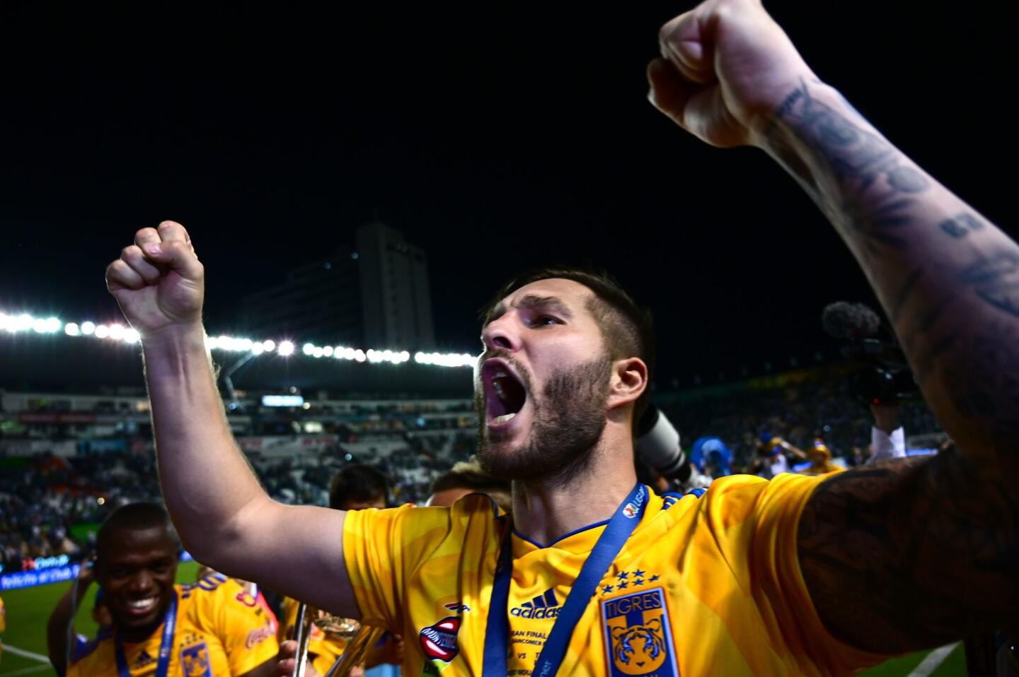 Tigres' French forward Andre Pierre Gignac (R) celebrate with teammates after winning the final match against Leon and the Mexican Clausura tournament 2019 at the Leon stadium on May 26, 2019, in Leon state of Guanajuato, Mexico. (Photo by PEDRO PARDO / AFP)PEDRO PARDO/AFP/Getty Images ** OUTS - ELSENT, FPG, CM - OUTS * NM, PH, VA if sourced by CT, LA or MoD **