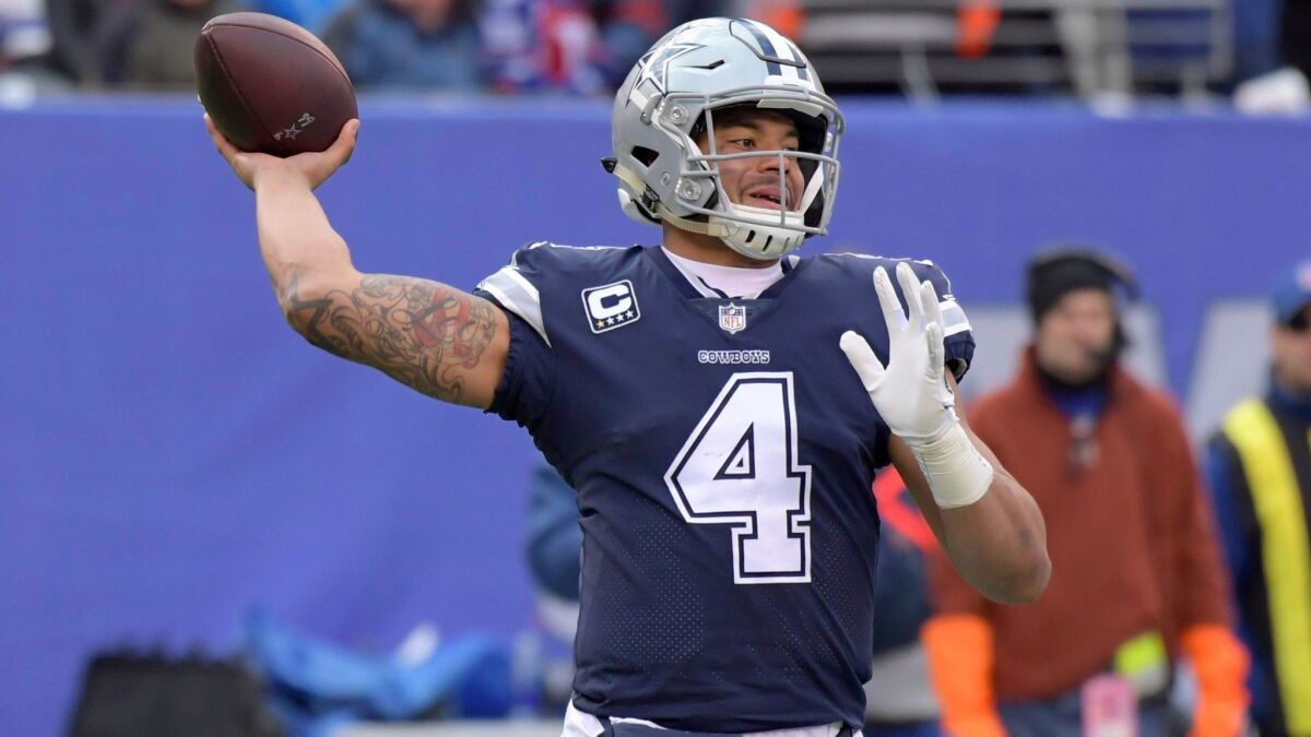 Dallas Cowboys quarterback Dak Prescott throws a pass Sunday during a game against the New York Giants in East Rutherford, N.J. The teams' games are part of Fox's National Football Conference package.
