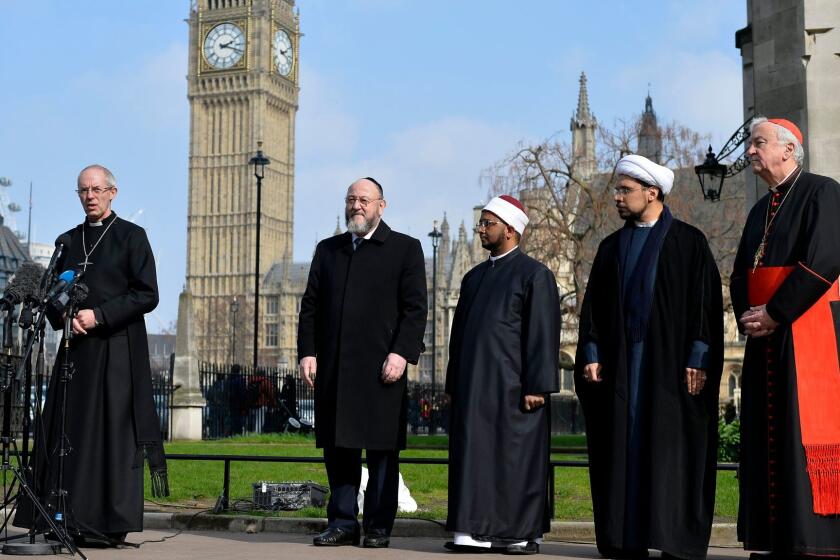 epa05867868 Britain's Archbishop of Canterbury Justin Welby (L) speaks as Inter-faith leaders listen during a vigil in the grounds of Westminster Abbey in London, Britain, 24 March 2017. Scotland Yard said on 24 March 2017 that police have made nine arrests in relation to the terror attack in the Westminster Palace grounds and on Westminster Bridge on 22 March 2017 leaving at least five people dead, including the attacker, and and more than 31 people injured. EPA/HANNAH MCKAY ** Usable by LA, CT and MoD ONLY **