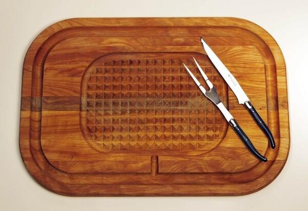 A carving set, including cutting board and knife and fork. RELATED: Holiday recipes from the L.A. Times Test Kitchen Get crafty this holiday season Suggestions for the cook on your Christmas list Get inspired by Times Restaurant Critic S. Irene Virbila