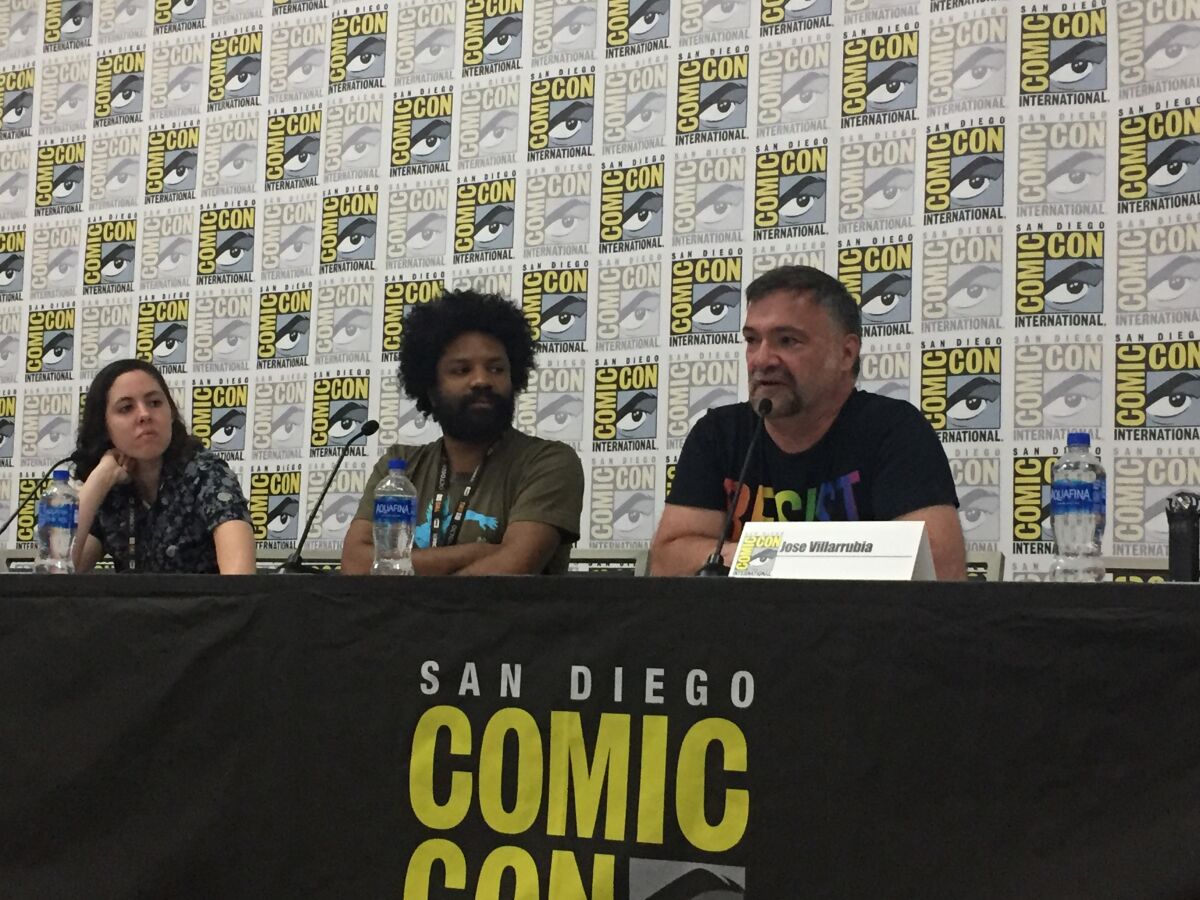 Speakers in the "Take PRIDE in Comics" panel at San Diego Comic-Con on Friday, from left, comic bookseller Siena Fallon, comic artist William O. Tyler and comics colorist Jose Villarubia.
