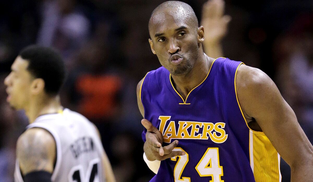 Lakers guard Kobe Bryant reacts after scoring against the Spurs in the second half Friday night in San Antonio.