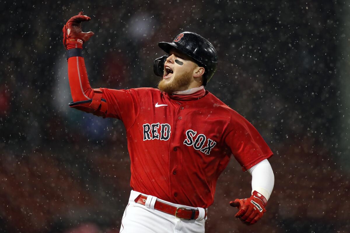 Boston's Alex Verdugo celebrates hitting a three-run home run against the Miami Marlins on May 28.