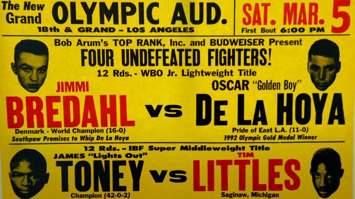 A fight promo card for the boxing matches during the Olympic's re-opening in 1994.