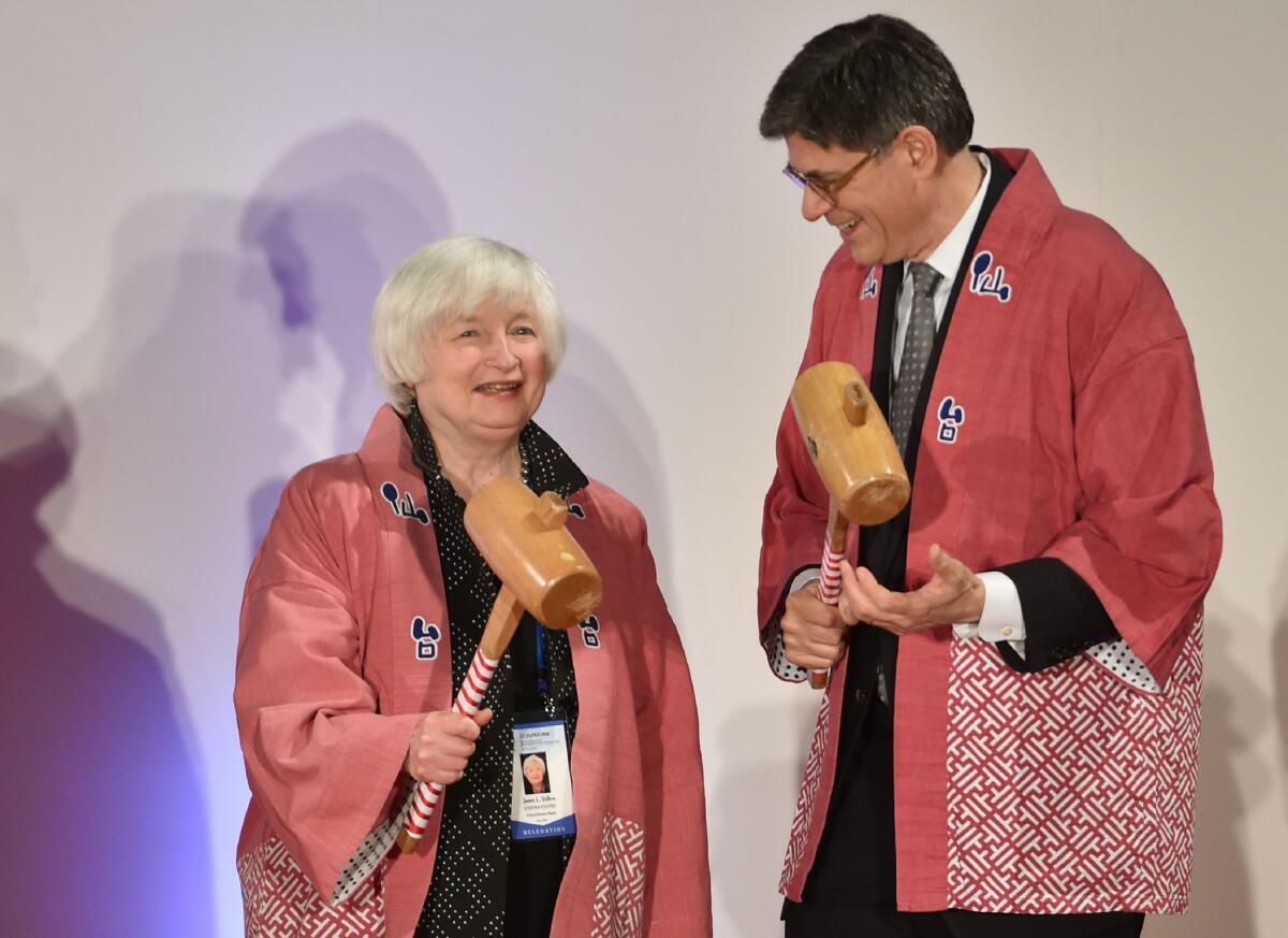 Federal Reserve Chairwoman Janet L. Yellen chats with Treasury Secretary Jacob J. Lew during a reception in Sendai, Japan, on May 19 before two days of economic meetings.