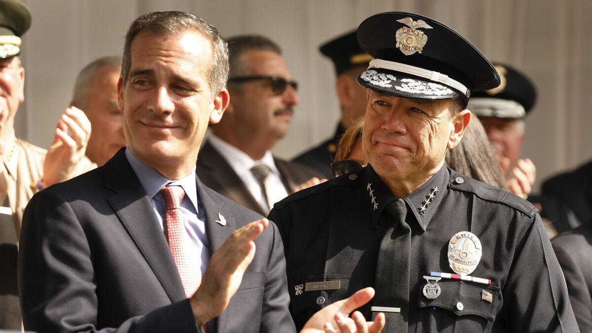 Reforms advocated by L.A. Mayor Eric Garcetti, left, for the city's controversial Deferred Retirement Option Plan for veteran police officers and firefighters would save the city nearly $13 million in the first year, according to a new city report.
