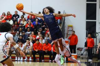 Lino Mark of Sherman Oaks Notre Dame shows off his athleticism against Harvard-Westlake.