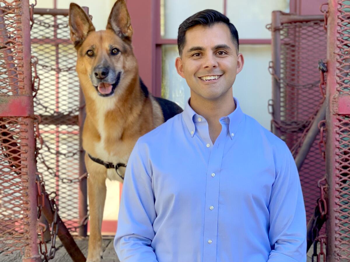 Joseph C. Rocha, a candidate for California Congressional District 50, with his dog.