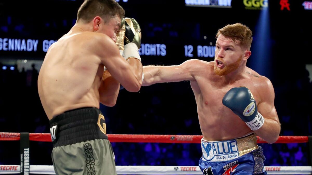 Canelo Alvarez throws a punch at Gennady Golovkin during their middleweight championionship bout at T-Mobile Arena on Sept. 16, 2017.