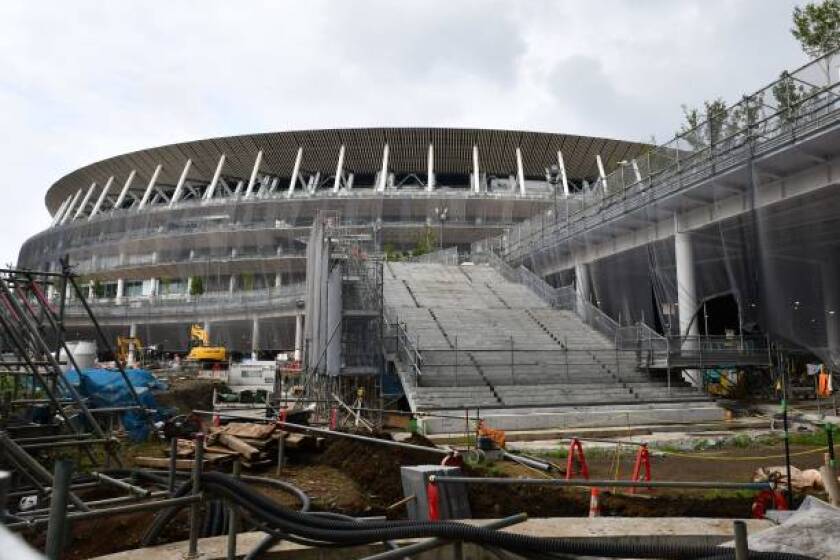 This picture shows the new National Stadium, still under construction, in Tokyo on July 23, 2019, nearly one year before the start of the Tokyo 2020 Olympic Games. (Photo by Kazuhiro NOGI / AFP) (Photo credit should read KAZUHIRO NOGI/AFP/Getty Images)