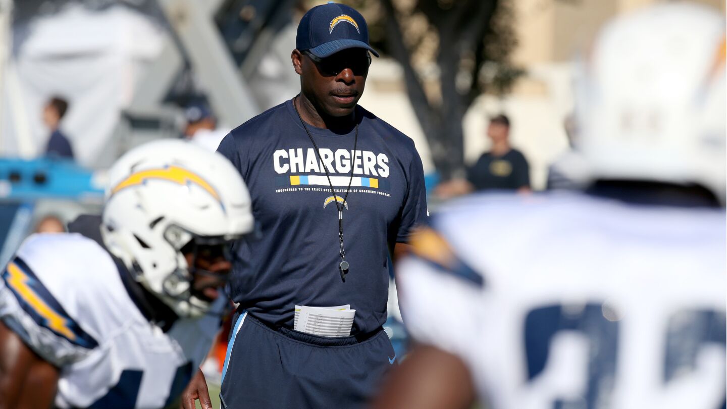 Chargers head coach Anthony Lynn directs his team during a joint practice between the Chargers and Rams.