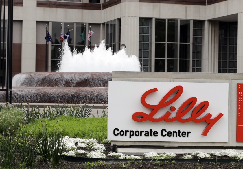 FILE- In this April 26, 2017, file photo shows the Eli Lilly and Co. corporate headquarters in Indianapolis. The Biden administration says it has purchased enough doses of a yet-to-be approved antibody drug to treat 600,000 patients with COVID-19. The medicine from pharmaceutical giant Eli Lilly will be shipped out to states free of charge if the Food and Drug Administration approves the company’s request for emergency use authorization, said Health and Human Services Secretary Xavier Becerra. (AP Photo/Darron Cummings, File)