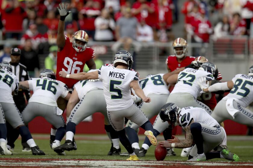 Seattle Seahawks place kicker Jason Myers (5) kicks a field goal in the first half during an NFL wild card playoff football game against the San Francisco 49ers on Saturday, Jan.14, 2023, in Santa Clara, Calif. (AP Photo/Scot Tucker)