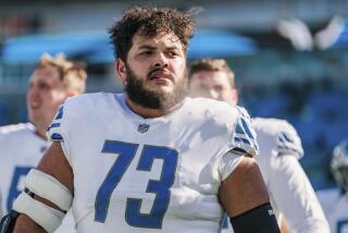 Detroit Lions guard Jonah Jackson (73) warms up before a game against the Carolina Panthers.