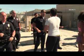 Residents confront LAPD after fatal shooting