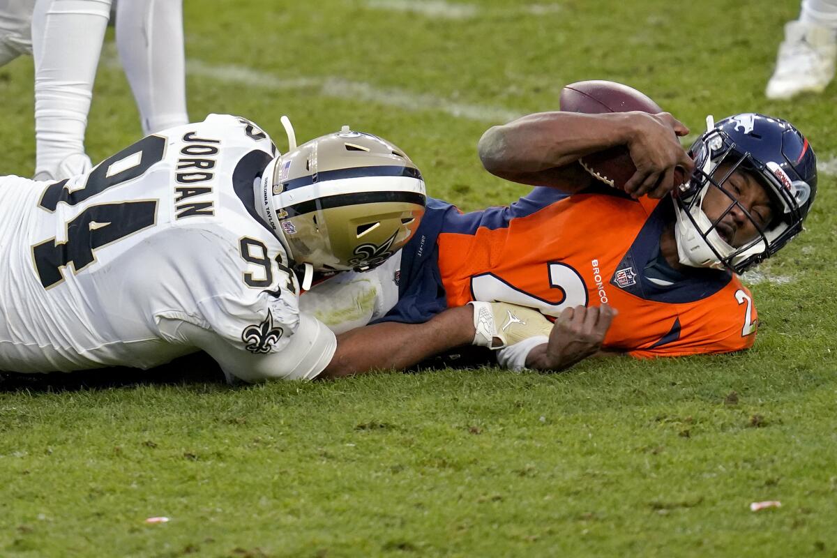 New Orleans Saints defensive end Cameron Jordan sacks Denver Broncos quarterback Kendall Hinton