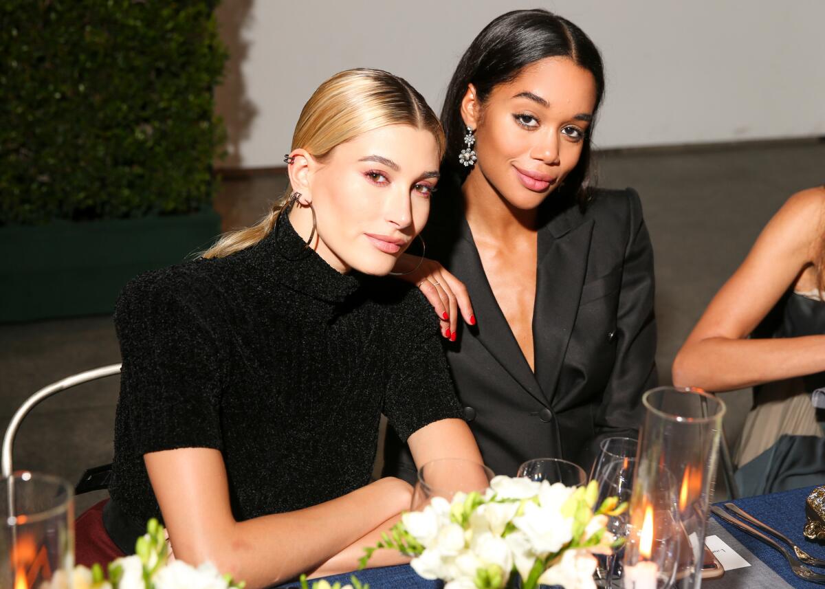 Hailey Baldwin, left, and Laura Harrier at the Hammer Museum gala.