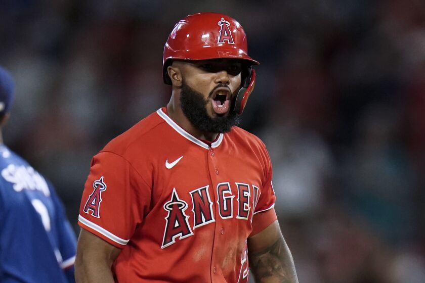 Los Angeles Angels' Luis Rengifo celebrates his two-run double against the Texas Rangers.