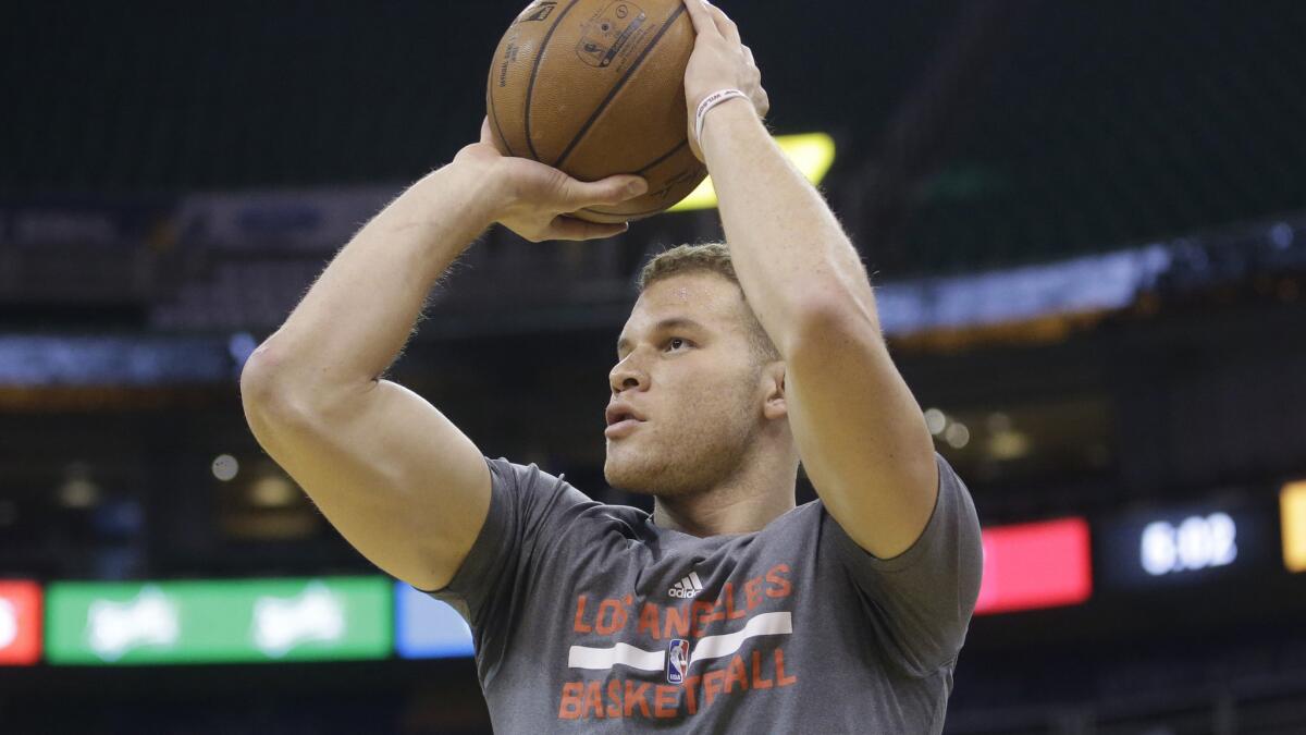 Clippers forward Blake Griffin practices his shooting before a game against the Utah Jazz on Wednesday.