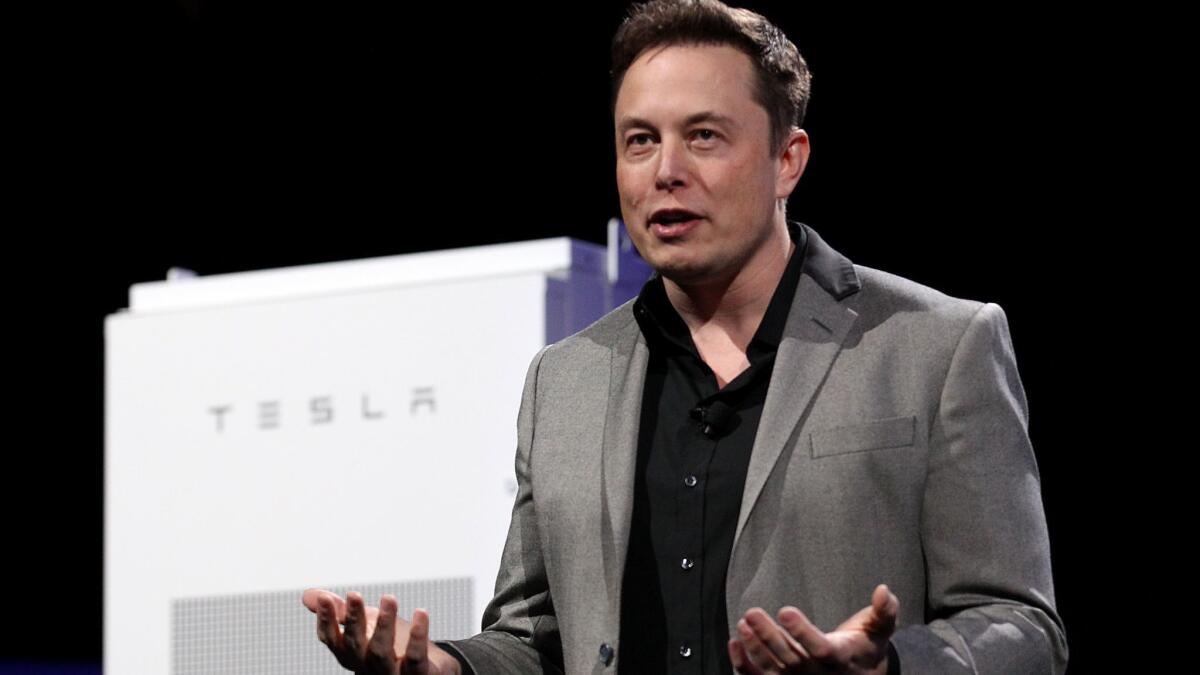 Tesla CEO Elon Musk unveils the Powerwall in April 2015.