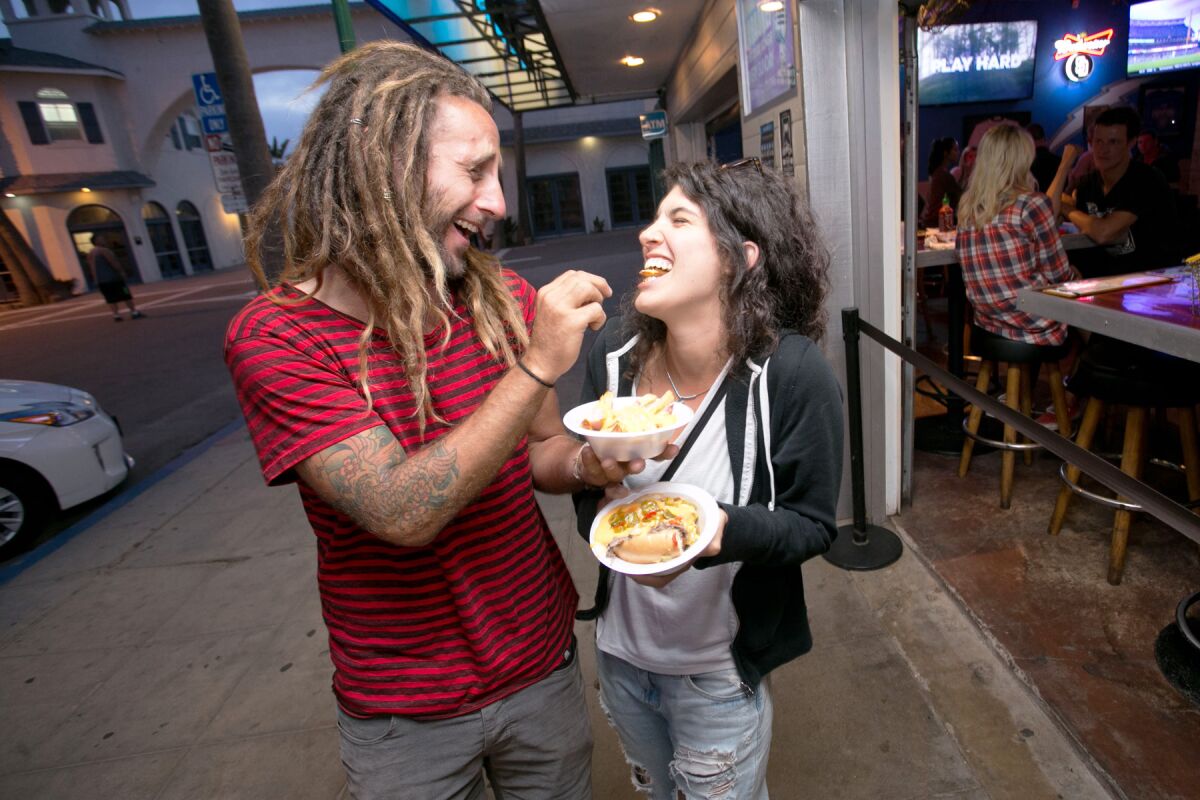 Sample foods while wandering among many restaurants between Ocean Boulevard and Dawes Street in Pacific Beach.
