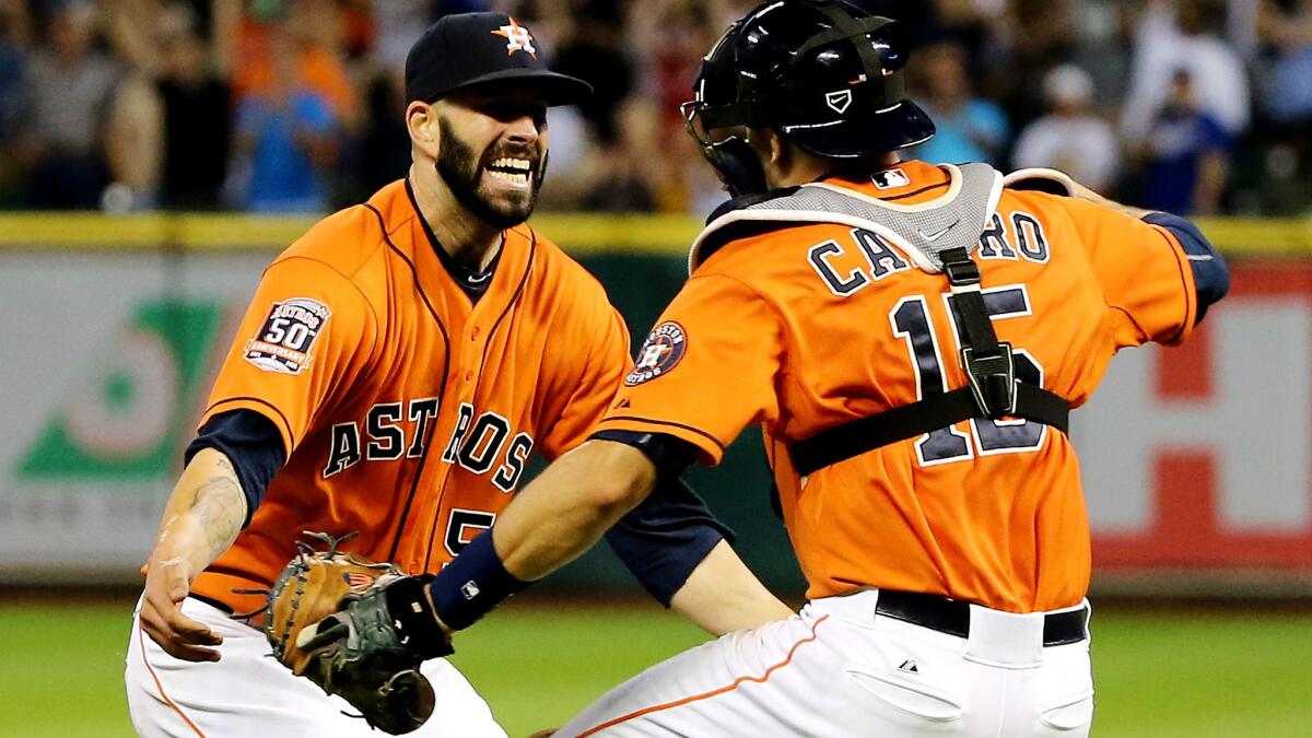 Astros starting pitcher Mike Fiers celebrates with catcher Jason Castro after throwing a no-hitter against the Dodgers on Friday night in Houston.