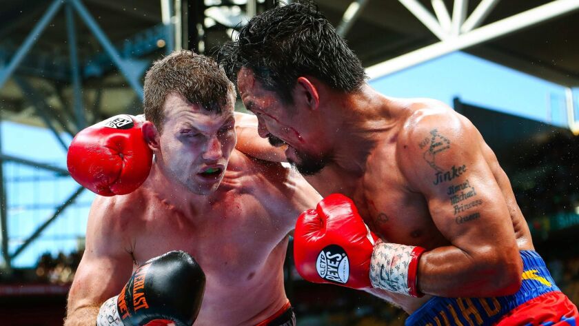 Jeff Horn, left, and Manny Pacquiao fight for the World Boxing Organization welterweight title on July 2.