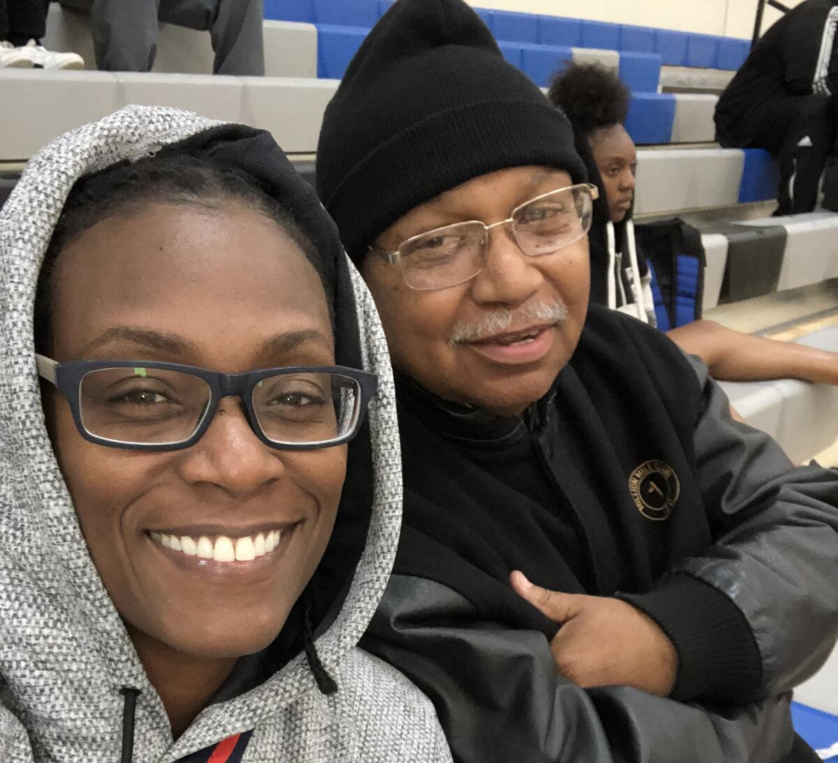 Jimmy Andrews, right, sits next to goddaughter Breeze McDonald, left.