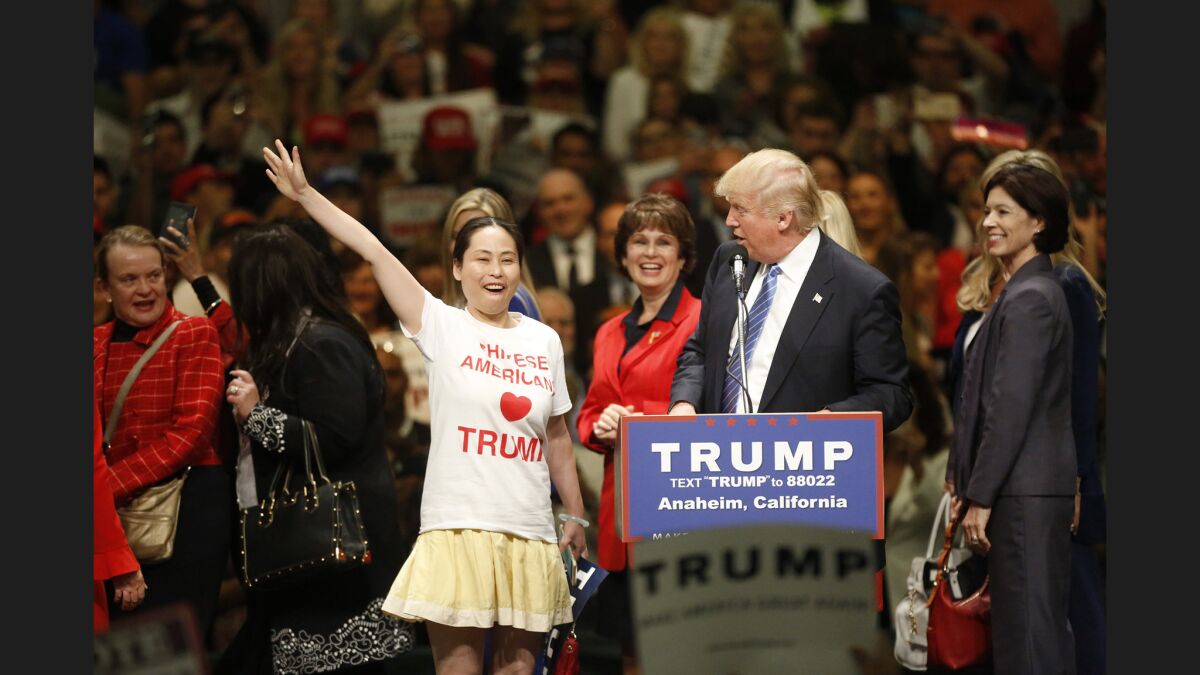 A woman shows her support for President Trump at a recent rally in Anaheim.