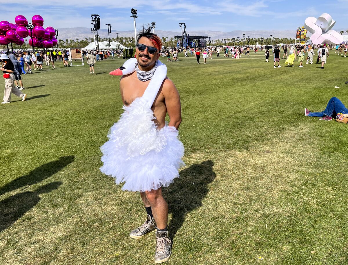 Marco Salazar wearing an outfit that looks like a swan