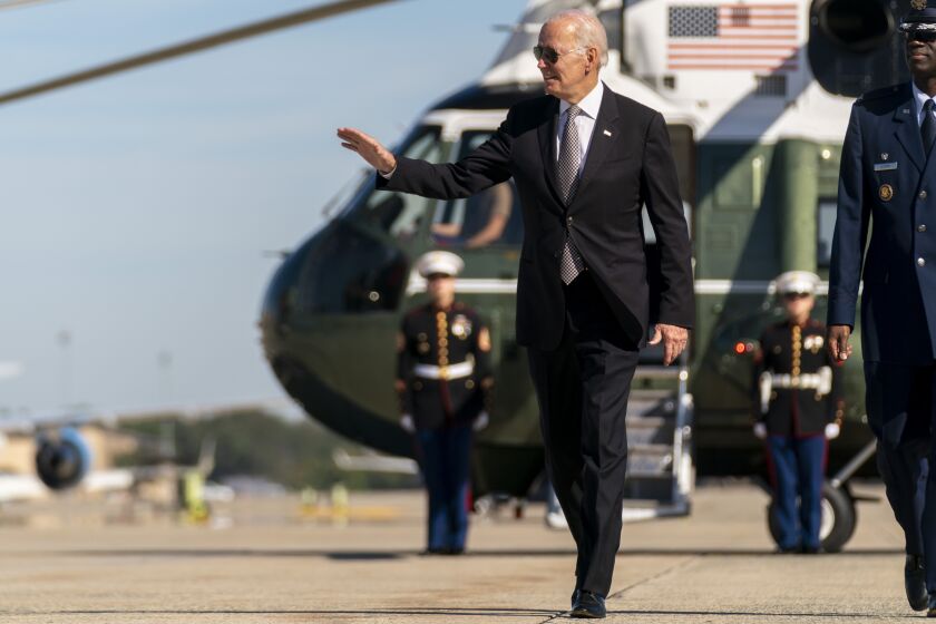 President Joe Biden boards Air Force One at Andrews Air Force Base, Md., Thursday, Oct. 6, 2022, to travel to Poughkeepsie, N.Y. (AP Photo/Andrew Harnik)