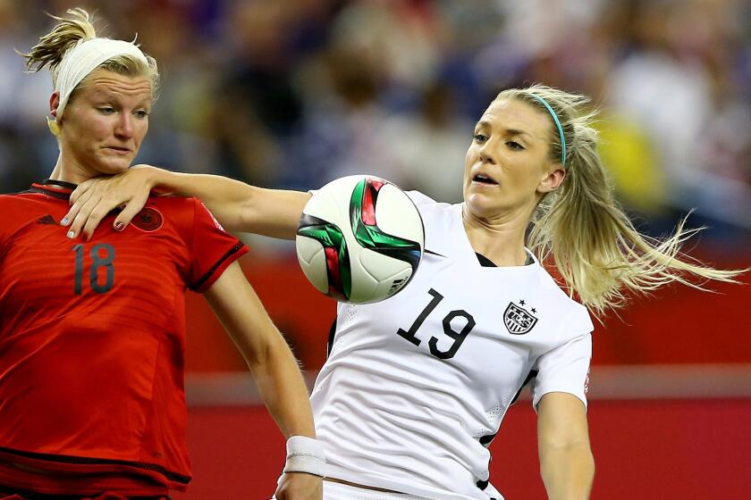 U.S. defender Julie Johnston fouls Germany's Alexandra Popp during the second half of a 2-0 victory in the women's World Cup semifinals on Tuesday.
