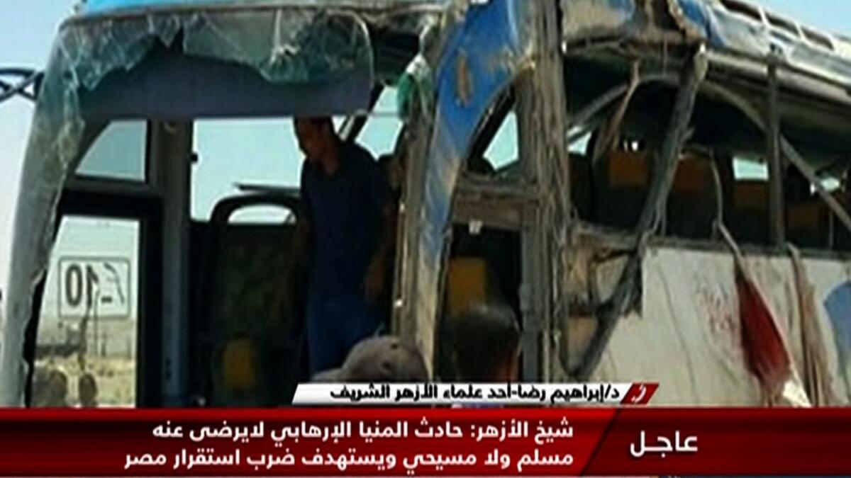 An image grab taken from Egypt's state-run Nile News TV channel on May 26 shows the remains of a bus that was attacked while carrying Egyptian Christians in Minya province, south of Cairo.